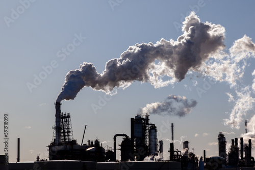 Channahon, Illinois, USA - March 27, 2022: An oil refinery facility silhouette 