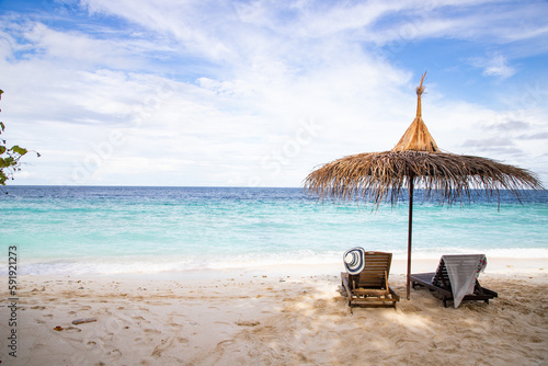 beach chairs on beautiful tropical beach © Melinda Nagy