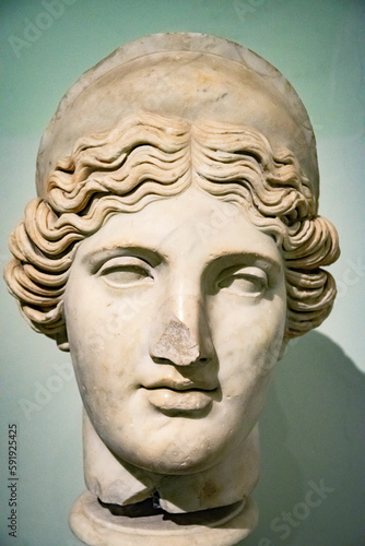 Photography Head and shoulders detail of the ancient woman with beard sculpture