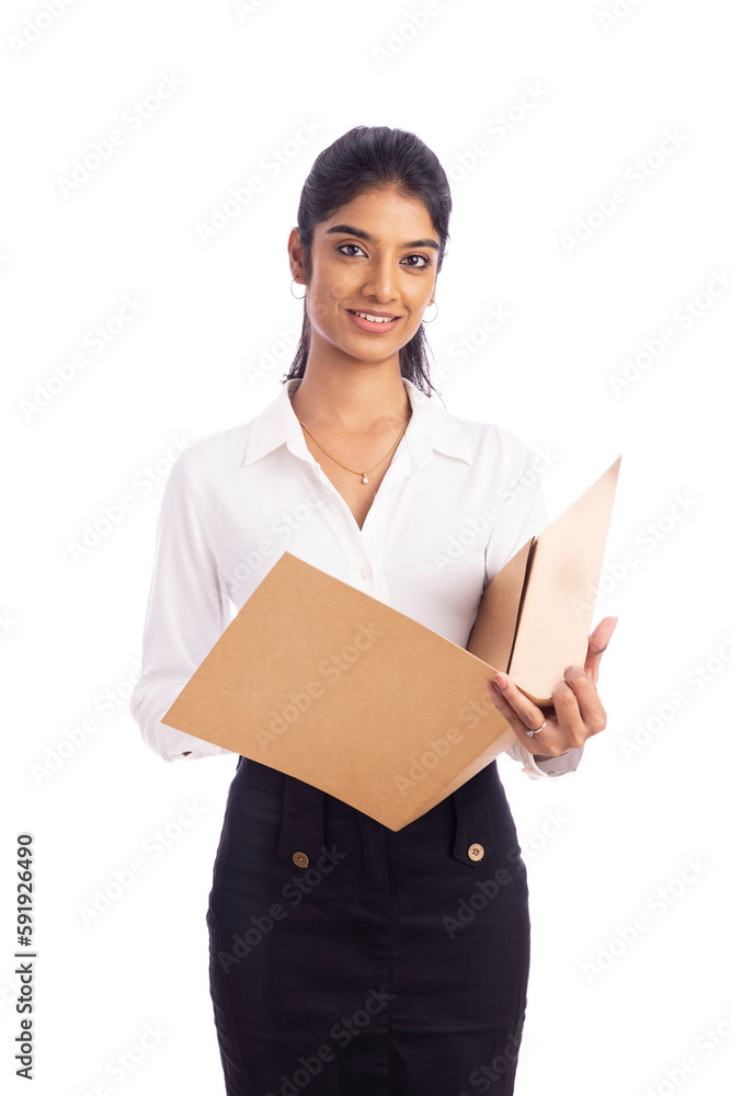 Young Indian business woman with file isolated on white. Young Indian business woman with file isolated on white.