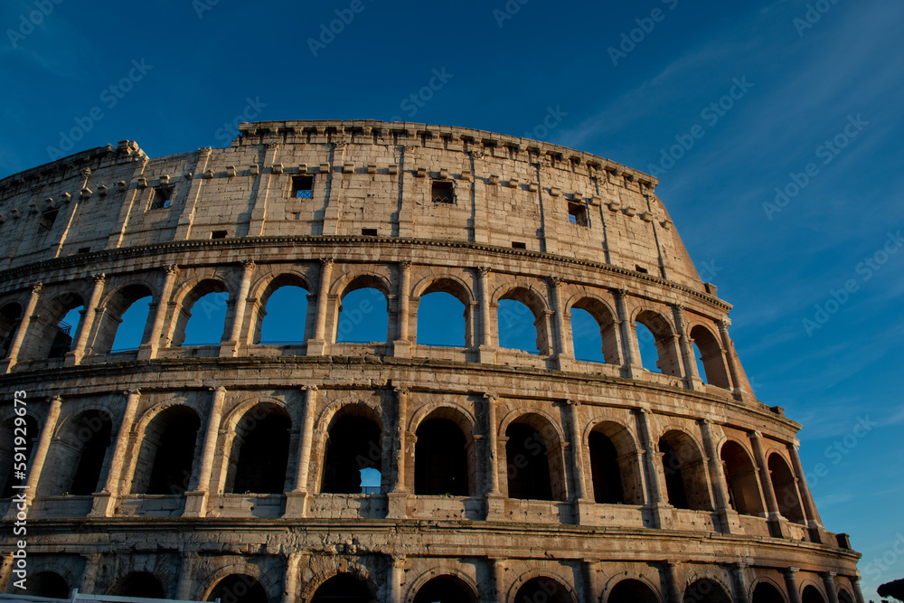 Colosseum, originally known as the Flavian Amphitheater . Located in the city center of Rome, it is the largest Roman amphitheater in the world