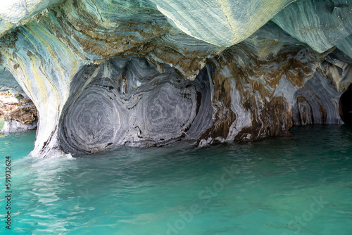 Marble Caves (Marble Cathedral), Puerto Rio Tranquilo, Aysen, Chile. The Marble Caves is a 6,000-year-old sculpture hewn by the crashing waves of Lake General Carrera of Patagonia. 