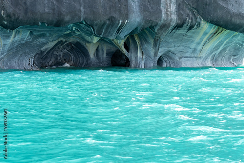 Marble Caves (Marble Cathedral), Puerto Rio Tranquilo, Aysen, Chile. The Marble Caves is a 6,000-year-old sculpture hewn by the crashing waves of Lake General Carrera of Patagonia. 