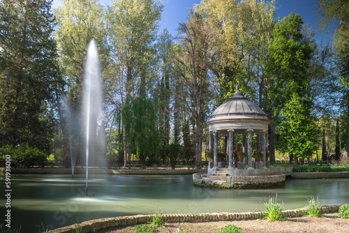 Pond of the Chinescos in the Jardines del Principe in Aranjuez, Madrid, Spain with gazebo with flowers and fountains