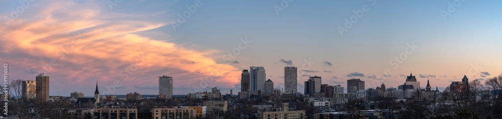 A panoramic view of the Milwaukee cityscape at dusk in early spring