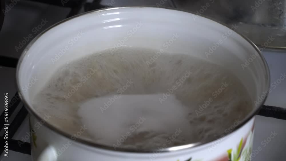 Pasta is boiled in a saucepan in boiling water Pasta is boiled in a saucepan in boiling water