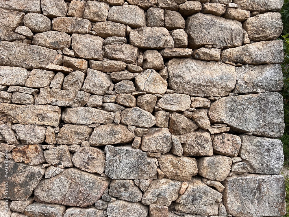 Detail of a traditional dry stone masonry from the south of France in the Cevennes Detail of a traditional dry stone masonry from the south of France in the Cevennes