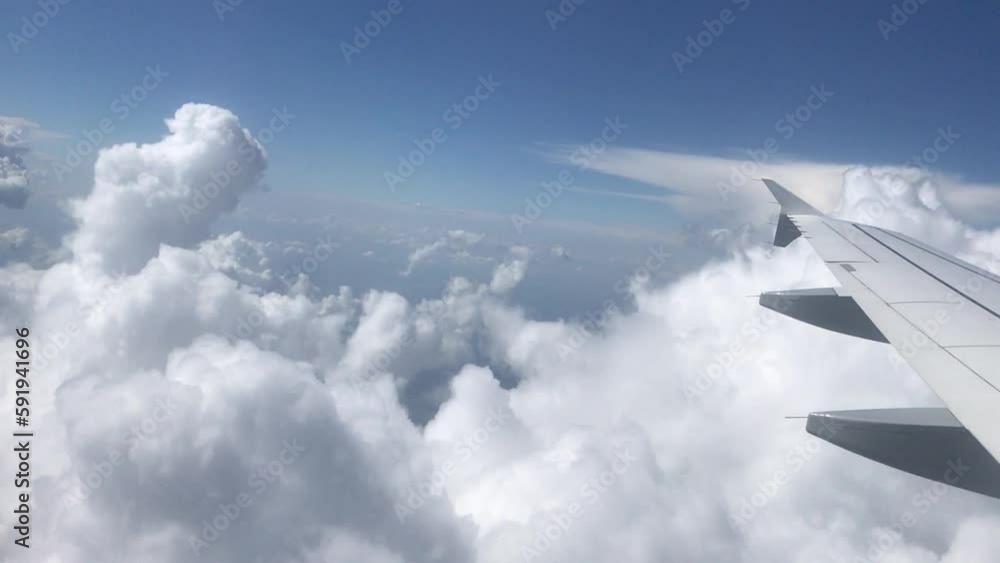 first person view of airplane windows. airplane in the sky first person view of airplane windows. airplane in the sky