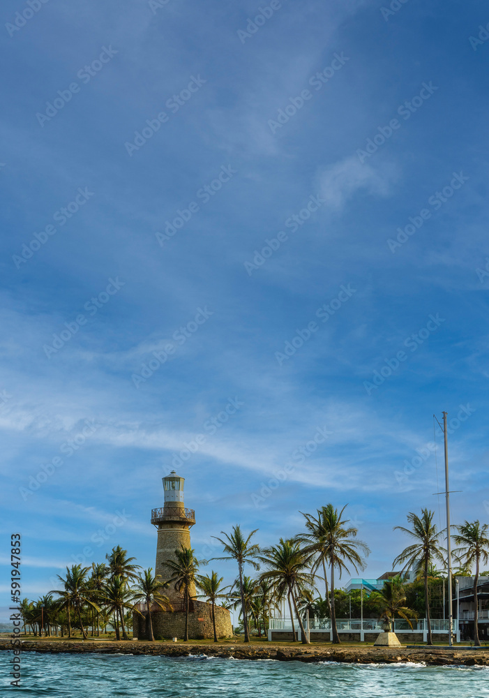 A lighthouse and the waterfront park in Cartagena city (Colombia).