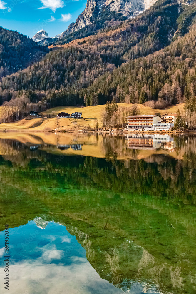 Alpine winter view with reflections and Mount Reiteralpe in the background at Lake Hintersee, Ramsau, Berchtesgaden, Bavaria, Germany Alpine winter view with reflections and Mount Reiteralpe in the background at Lake Hintersee, Ramsau, Berchtesgaden, Bavaria, Germany
