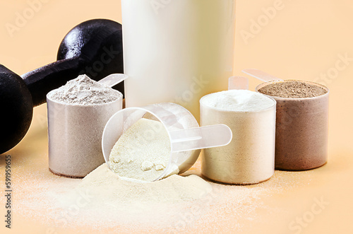 Fotografie whey or casein shake, whey smoothie with protein chocolate bar, weight training