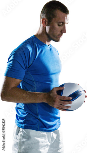 Thoughtful sports player holding ball