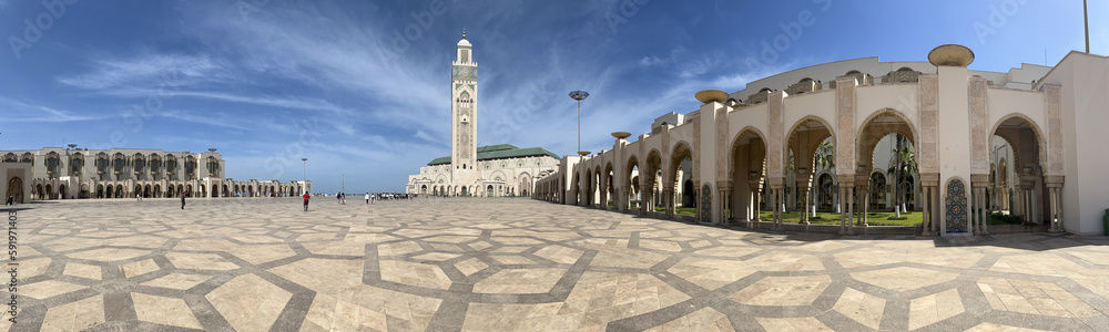 Casablanca, Morocco, Africa: view of The Hassan II Mosque and its minaret, designed by Michel Pinseau under the guidance of King Hassan II and built by Moroccan artisans from all over the kingdom