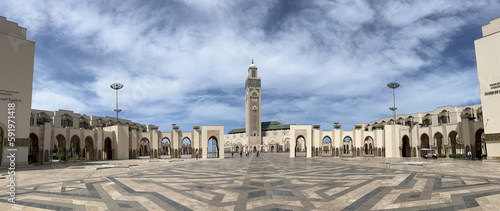 Casablanca, Morocco, Africa: view of The Hassan II Mosque and its minaret, designed by Michel Pinseau under the guidance of King Hassan II and built by Moroccan artisans from all over the kingdom