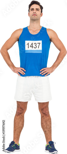 Male athlete standing on white background