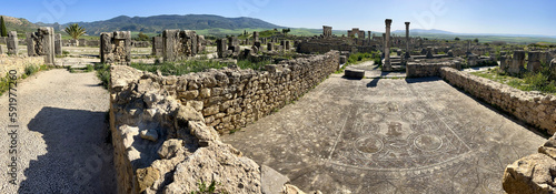 Morocco, Africa: panoramic view of the remains of Volubilis, the most famous Roman archaeological site in Morocco, near Meknes, at the foot of Zerhoun mountain photo