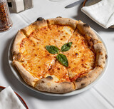 Margherita pizza, served in Italian restaurant