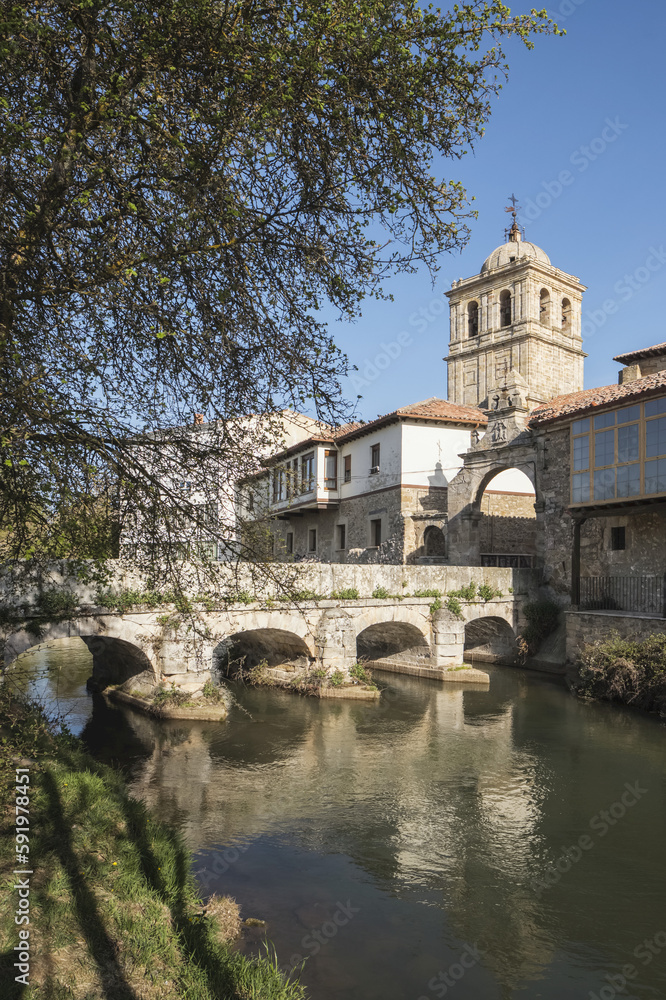 Puente del Portazgo, Puerta del Portazgo with 14th century Colegiata de San Miguel in background; Aguilar de Campoo, Palencia; Spain Puente del Portazgo, Puerta del Portazgo with 14th century Colegiata de San Miguel in background; Aguilar de Campoo, Palencia; Spain