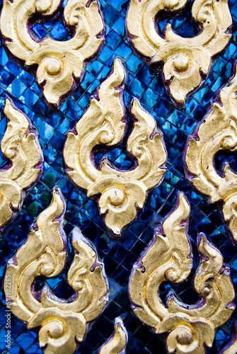 Thailand, Bangkok, Wat Pho, Detail Of Temple, Blue With Golden Shapes. photo