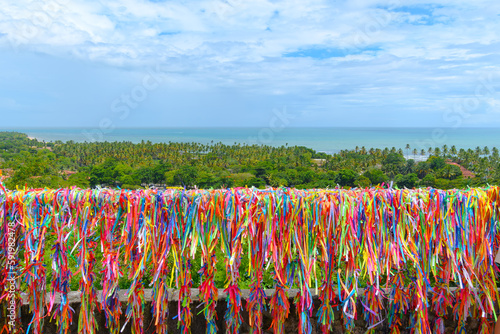 Colored ribbons of Nossa Senhora d'Ajuda at the Belvedere of Arraial d'Ajuda, Porto Seguro - Bahia.