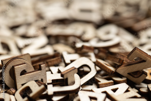 Assorted Wood Letters in Piles