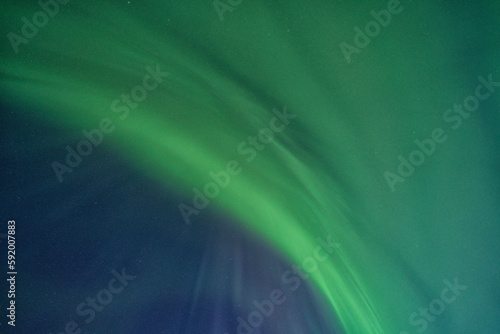 Aurora Borealis or northern lights glow green in the skies over Churchill; Churchill, Manitoba, Canada