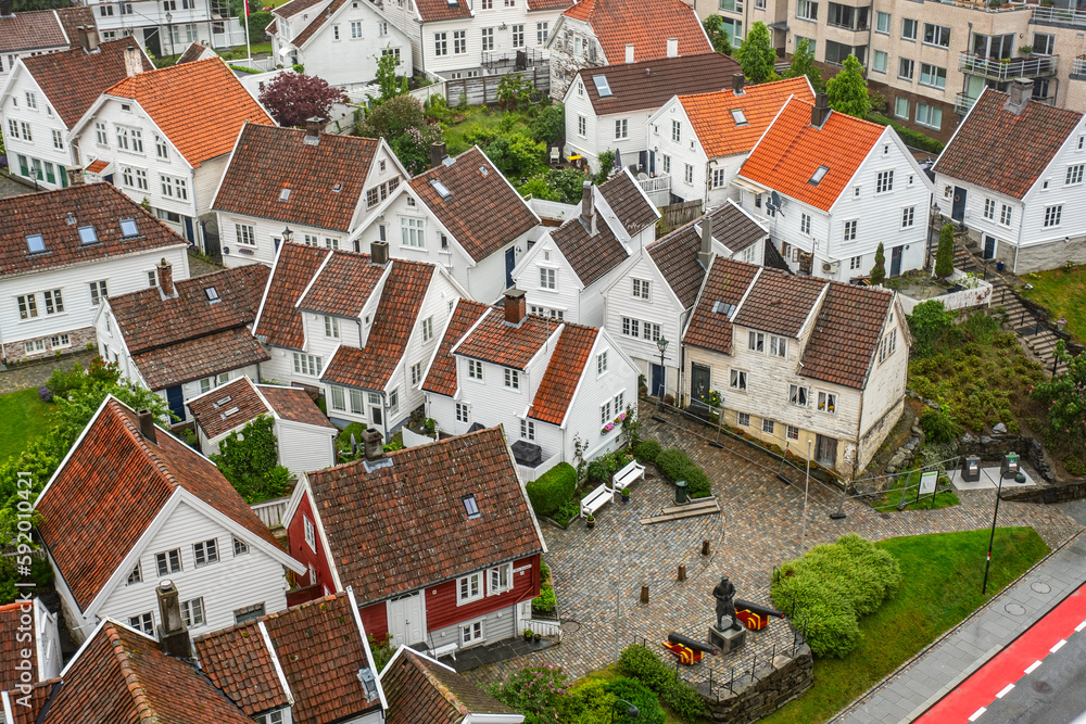 Aerial city view with traditional wooden houses and red roofs at early morning. Stavanger, , Rogaland, Norway
