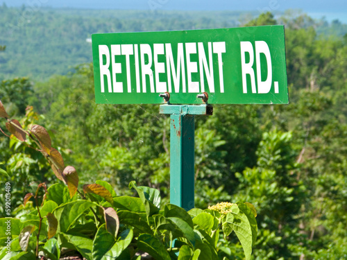 Retirement road sign in the lush countryside reading 'Retirement Road'; Bluefields Bay, Jamaica photo