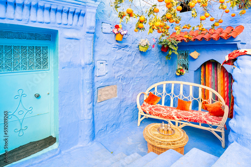 Mint tea hospitality in Chefchaouen.Its a city in northwest Morocco. It is the chief town of the province of the same name, and is noted for its buildings in shades of blue. © minoandriani