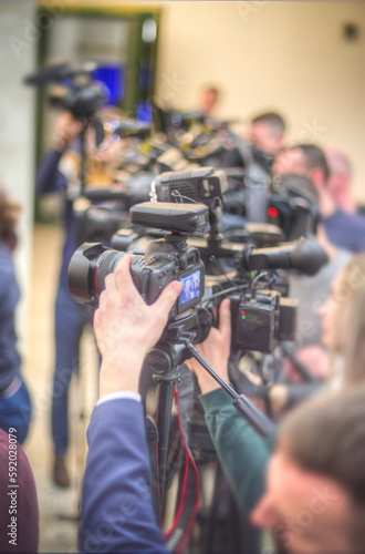 cameraman filming an interview