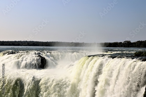 water pouring in the Devil's throat waterfall (Garganta del diablo) at Iguazu falls, Argentina