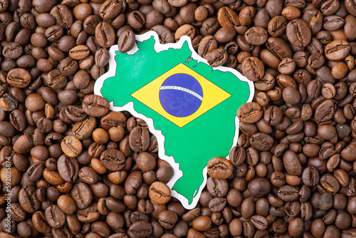 Flag and map of Brazil on coffee grain. Coffee industry in Brazil concept