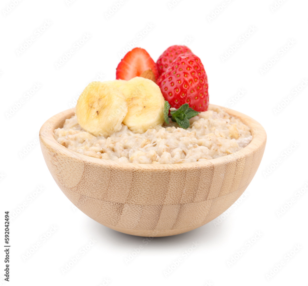 Wooden bowl with tasty oatmeal, bananas and strawberries isolated on white background Wooden bowl with tasty oatmeal, bananas and strawberries isolated on white background