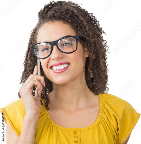 Businesswoman wearing glasses while using mobile phone over white background