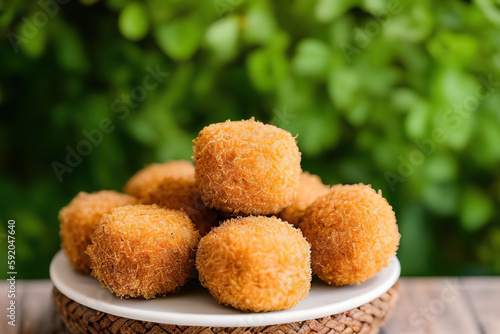 Mouthwatering Croquetas, a Spanish Delicacy, Served with Savory Sauce