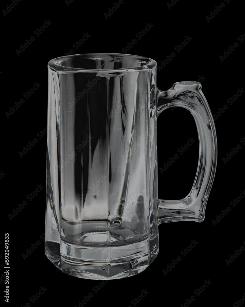 Empty beer glass isolated on black background. Single beer mug or Toby jug. Closeup.
