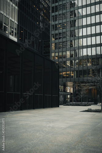 Business and finance concept street, moody photography view looking at modern office building architecture in the Toronto financial district King street, Ontario, Canada.