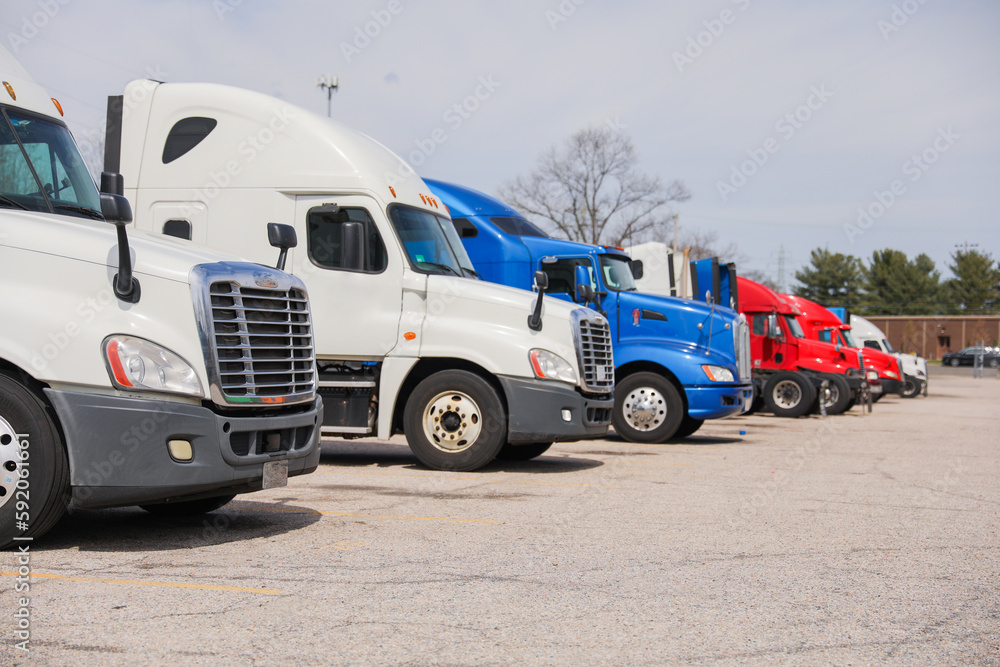 trucks and trucking as symbols of commerce, industry, and mobility. They transport goods across vast distances, fueling the economy and connecting communities.