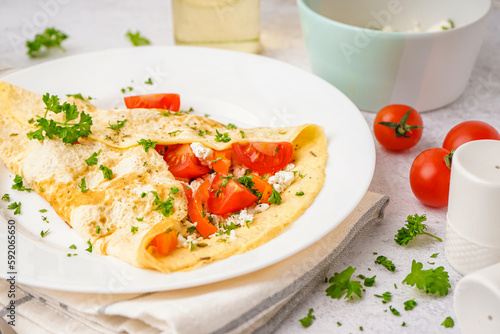 Savory omelet with fresh to...