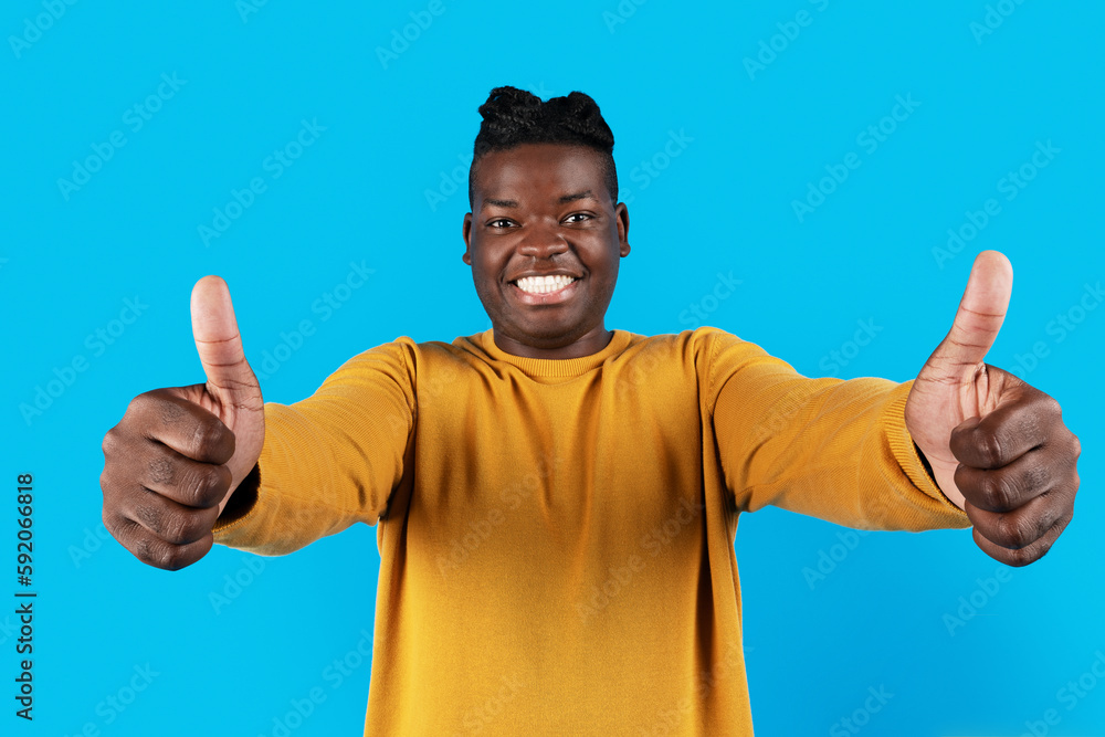 Nice Choice. Happy Excited Black Man Showing Two Thumbs Up At Camera Nice Choice. Happy Excited Black Man Showing Two Thumbs Up At Camera