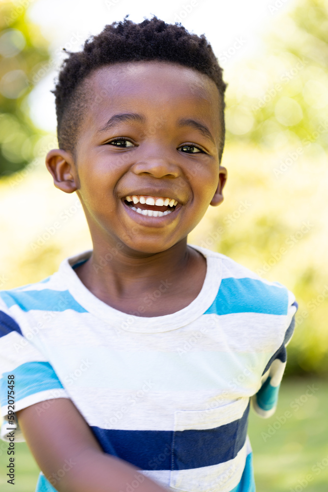 Closeup portrait of cheerful african american cute boy smiling and looking at camera Closeup portrait of cheerful african american cute boy smiling and looking at camera