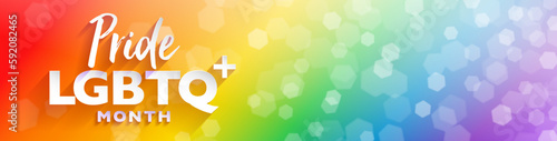 Colorful LGBTQ plus PRIDE month banner for festival parades and party events with abstract rainbow bokeh background. Vector illustration. for template, horizontal poster, background banner and social 