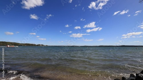 Scenic sandy beach on Lake Macquarie in Murrays beach town of Australia 4k
 photo