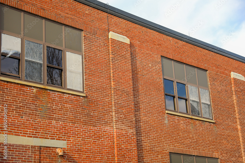 Old brick buildings are a symbol of industrial heritage, innovation, and hard work. They represent the industrial revolution and the rise of manufacturing and industry Old brick buildings are a symbol of industrial heritage, innovation, and hard work. They represent the industrial revolution and the rise of manufacturing and industry