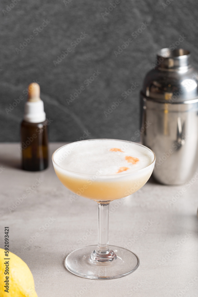Whiskey Sour cocktail booze bourbon whiskey, lemon juice, simple syrup, egg white and aromatic bitters