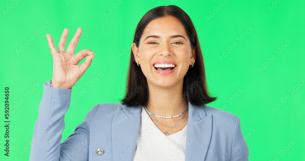 Ok hands, face and happy woman on green screen, background and review of business support. Portrait of female employee, smile and okay for success, yes and bonus for perfect emoji, thank you and sign