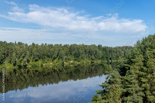 Wide river in summer in sunny weather