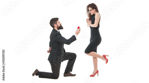 Pure feelings. Will you marry me. i said yes. happy valentines day. tuxedo couple formal event. couple in love celebrate engagement. wedding party time. man on one knee making marriage proposal