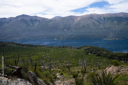View of the forest, Gutierrez lake and Catedral hill in Bariloche, Patagonia Argentina.