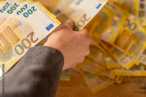 Counting banknotes.Hands recalculate banknotes.Expenses and incomes in European countries.pack of money in a hand close -up.Recalculation of money.